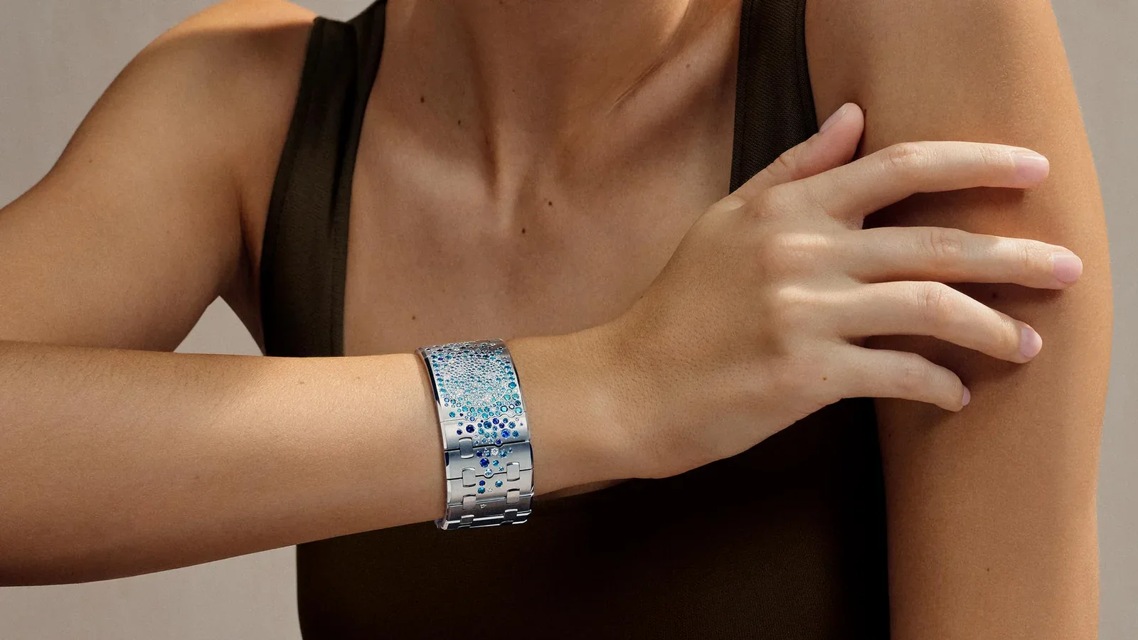 The one-of-a-kind Dream of Joux Blue Moon cuff in 18k white gold, set with diamonds, deep blue sapphires, and Swiss blue and London blue topazes / Photo Credit: Audemars Piguet