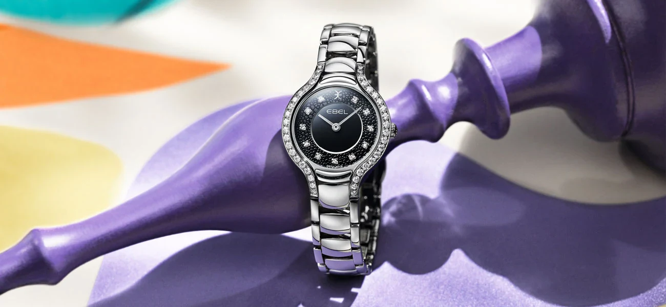 F.P. Journe Chanel Ebel: a diamond-set EBEL Beluga with a black dial on a steel bracelet