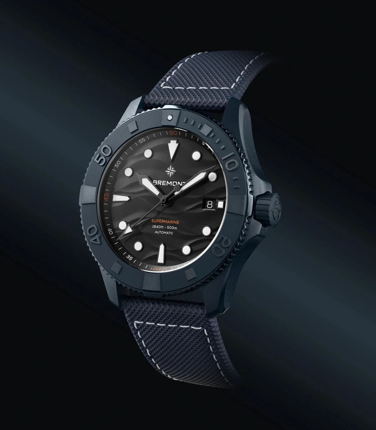 Bremont Supermarine Full Ceramic Deep Blue 43mm blue mono-block ceramic case with black wave-effect dial on a blue strap