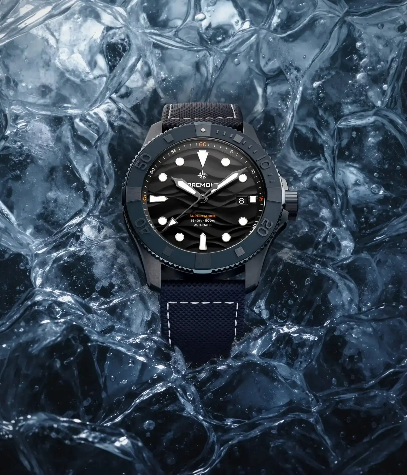 Bremont Supermarine Full Ceramic Deep Blue dive watch resting on clear blue ice