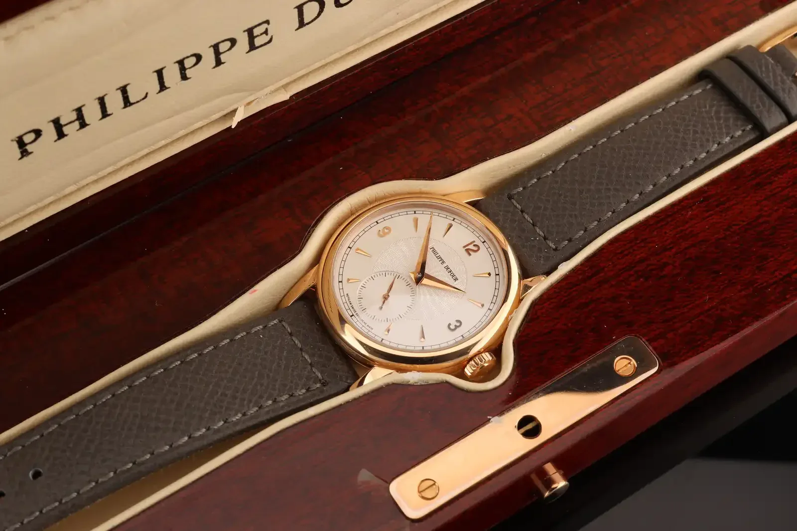 Philippe Dufour Simplicity auction lot No. 199 resting in its signed wooden Philippe Dufour presentation box