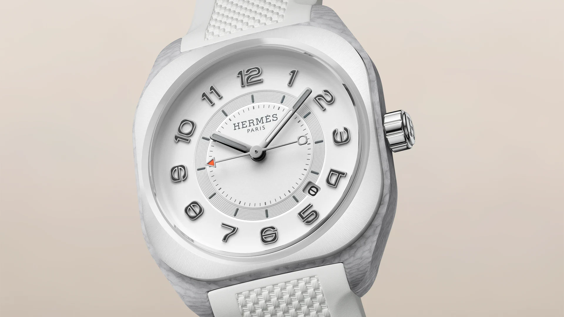 Hermès H08 Blanc with white ceramic bezel, white lacquered dial, and marbled fiberglass composite case on a white rubber strap