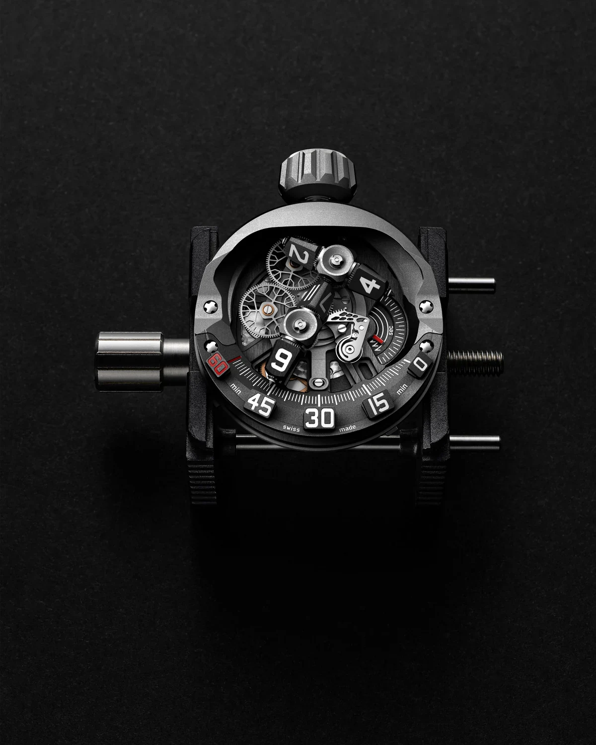 URWERK UR-300 Time Quantum UR-30.01V movement in a holder, showing the hour prisms and minute track