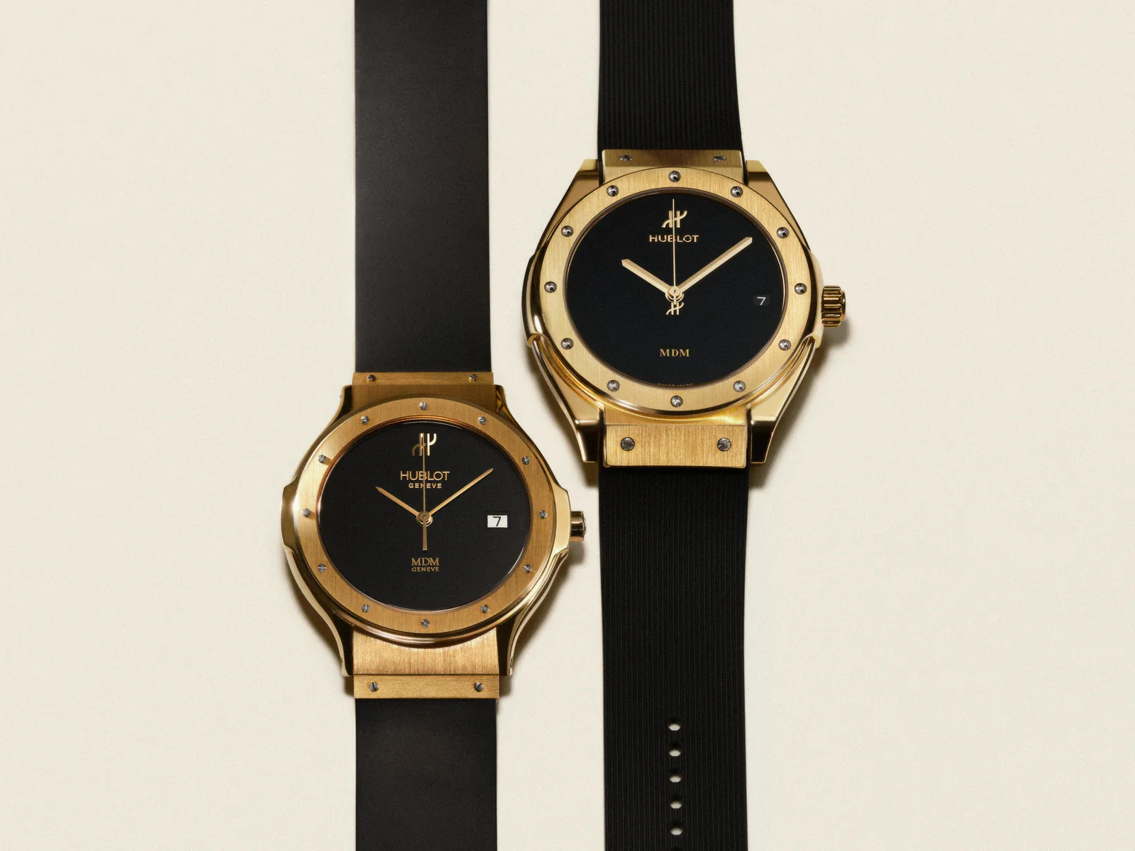 The original Hublot beside the new Hublot Classic Fusion Tributo in 18k yellow gold on black rubber straps