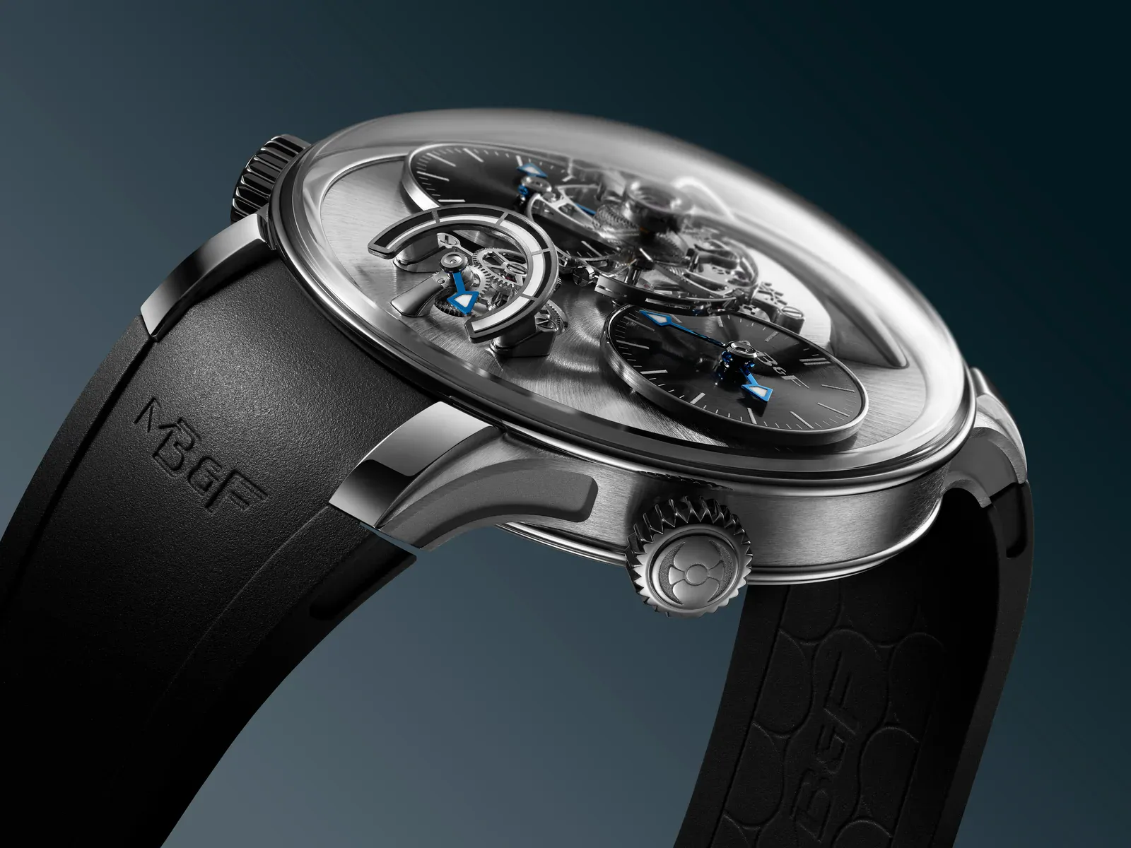 Angled view of the titanium MB&F LM1 EVO showing the floating 14mm balance wheel above the dial