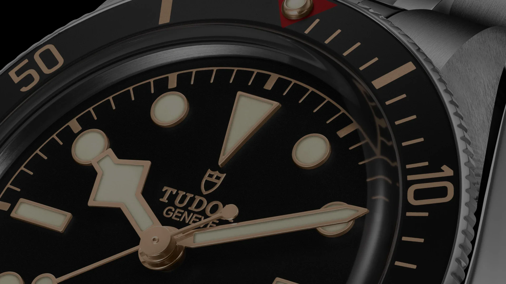 Black Bay 58 vs Seamaster 300M: close-up of the Tudor Black Bay 58 domed black dial with snowflake hour hand and gold-tone bezel markings