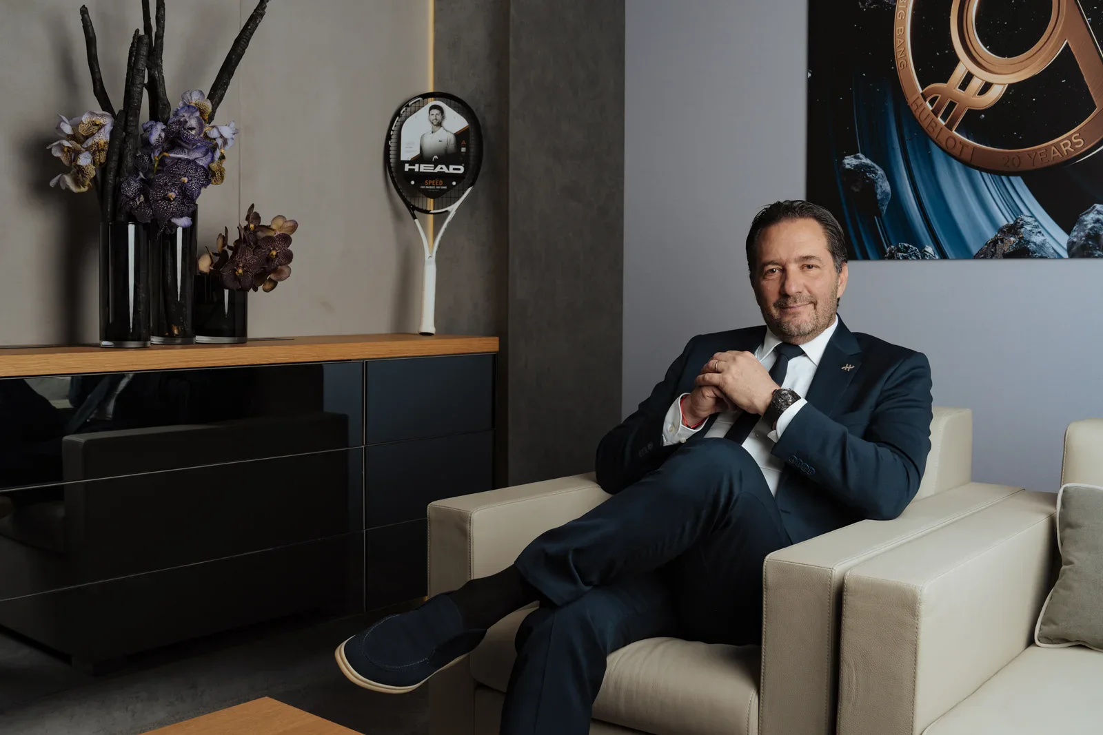 Hublot CEO Julien Tornare seated in his office, as François-Henry Bennahmias joins Hublot as a consultant