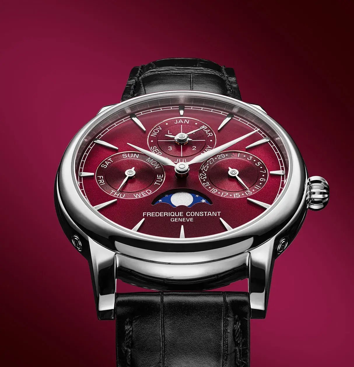 Burgundy dial of the Frederique Constant perpetual calendar watch showing day, date, month, leap year and moon phase