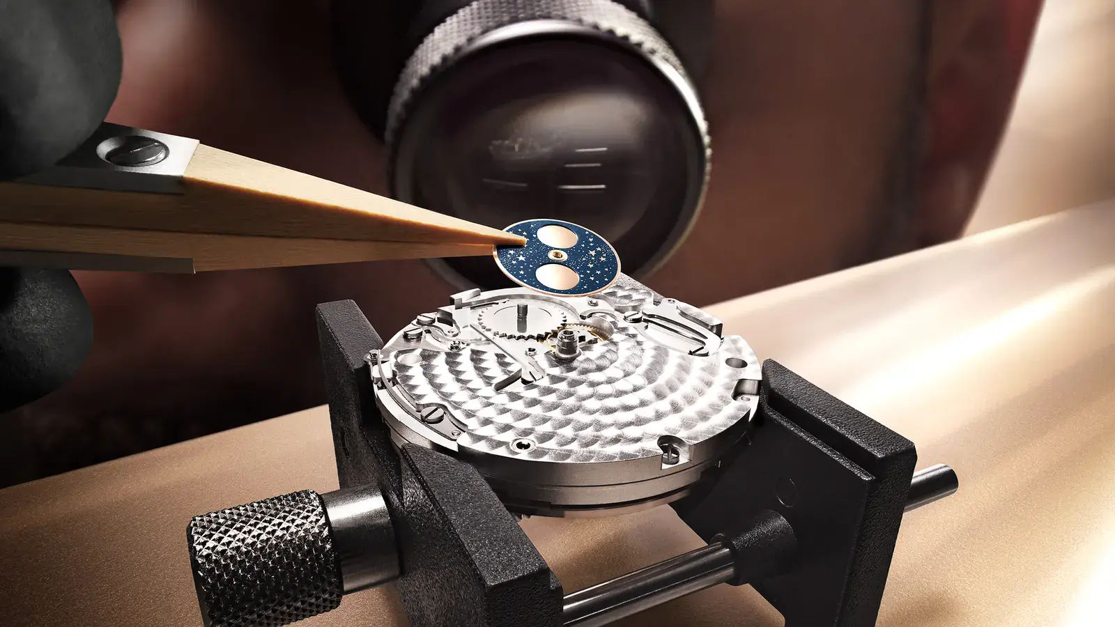 Watchmaker fitting the moon-phase disc of the Jaeger-LeCoultre Master Ultra Thin Moon