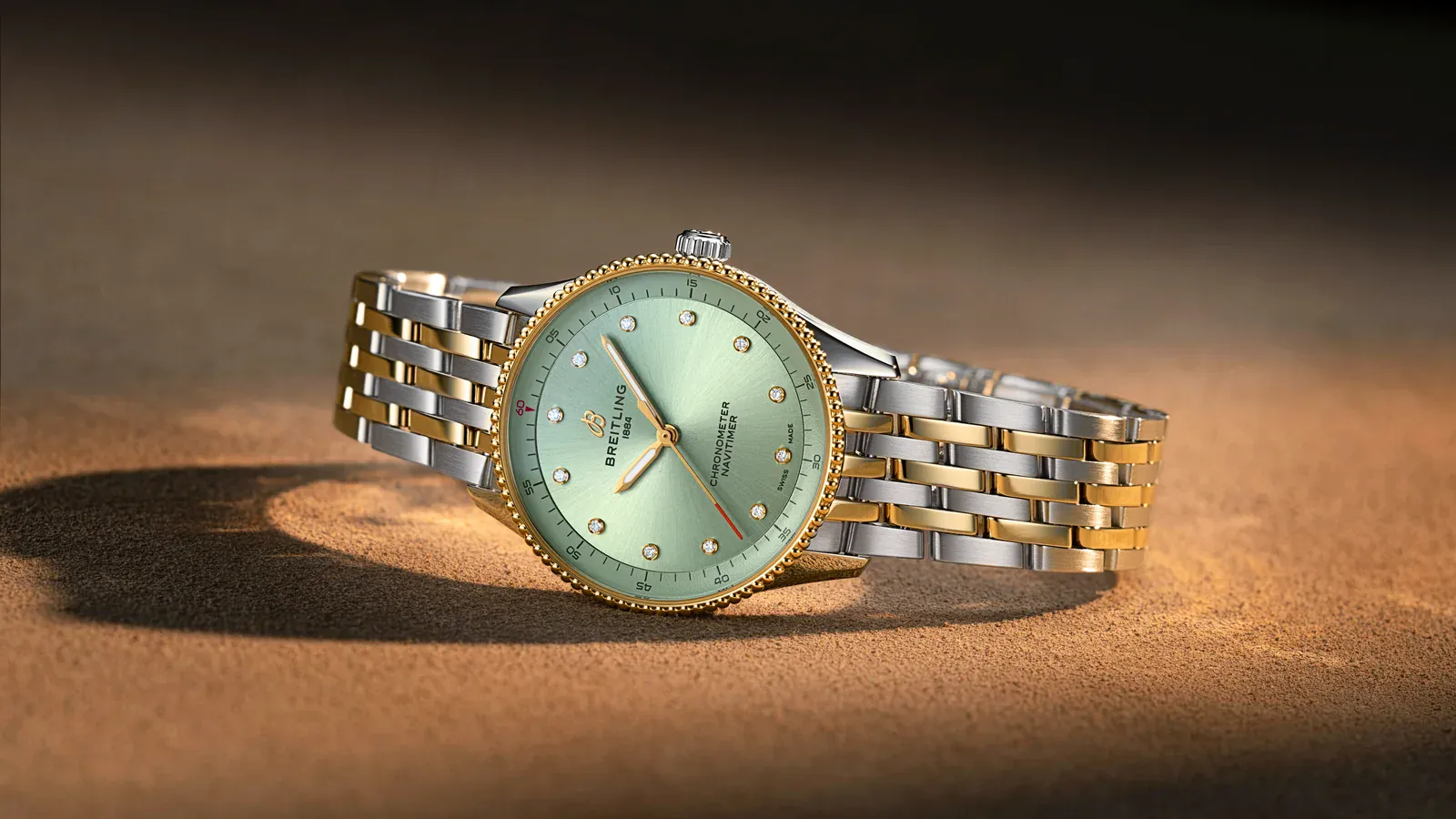 Breitling Navitimer Watches of Switzerland exclusive Navitimer 32 with mint green dial in two-tone steel and 18k yellow gold