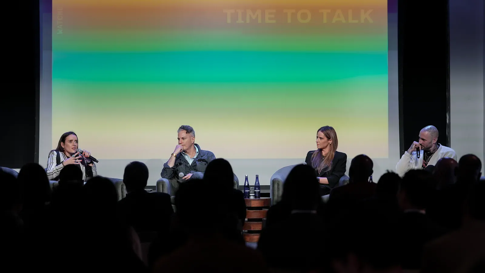 Four-person panel on stage at the FHH Watch Summit in New York discussing the US watch market