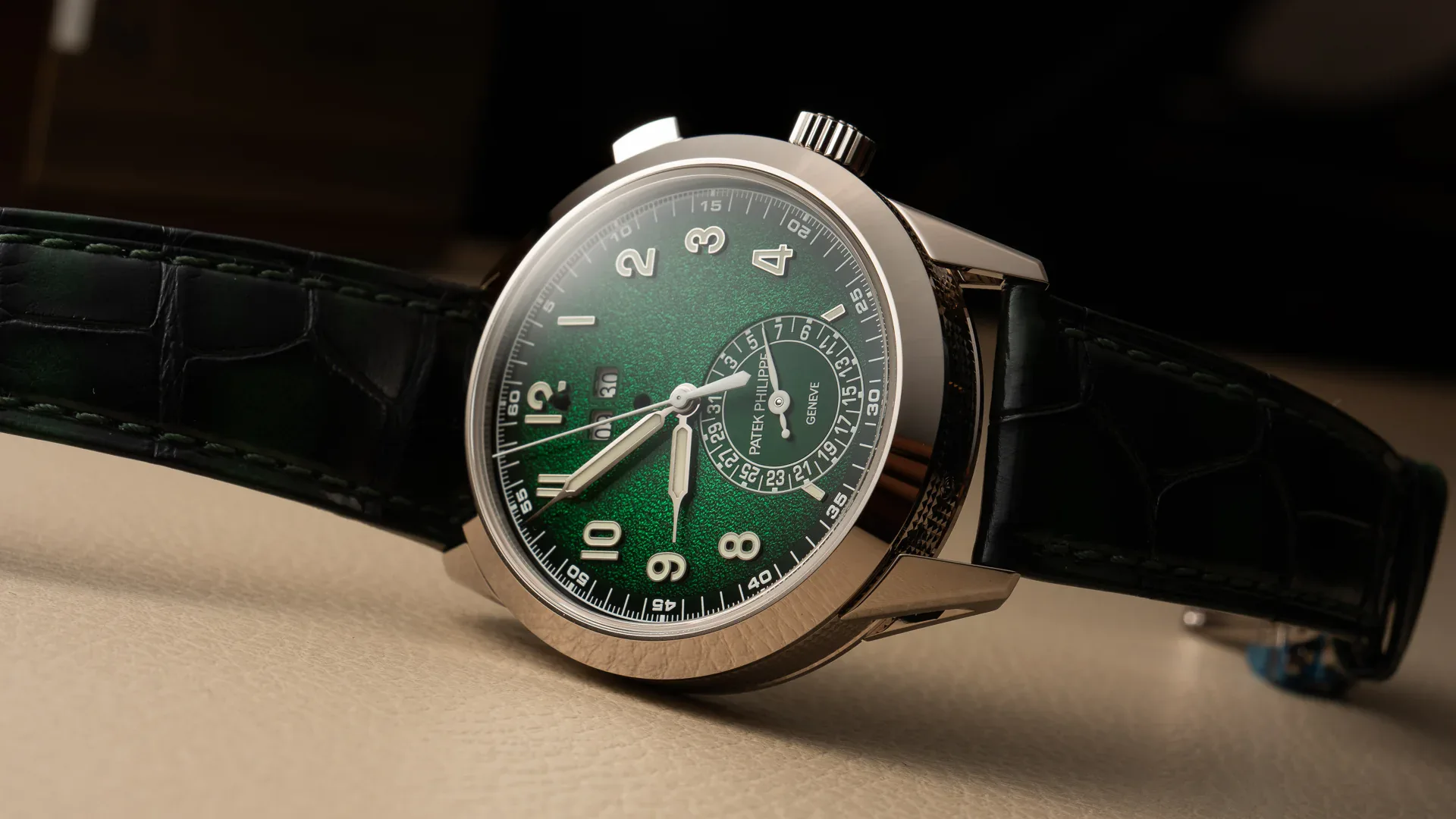 Patek Philippe 5322G-010 chiming alarm with textured green lacquered dial, angled view
