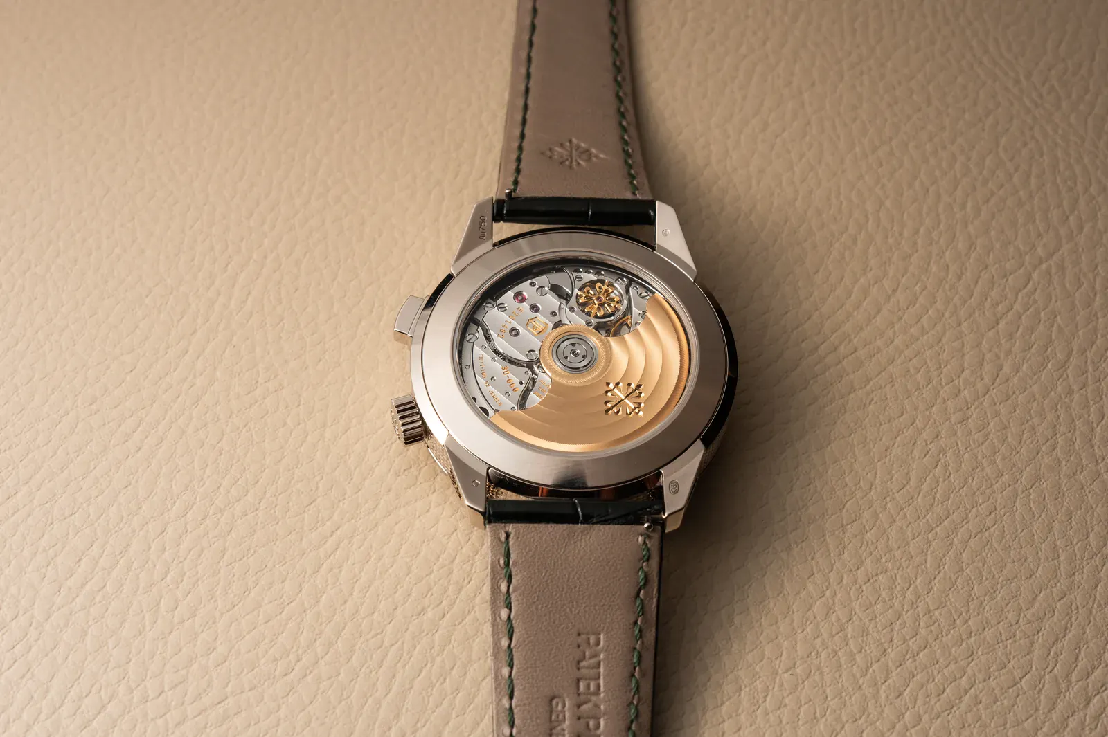 Patek Philippe 5322G chiming alarm caliber AL 30-660 S C seen through the sapphire caseback