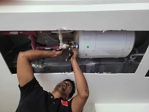 Above false ceiling storage water heater replacement