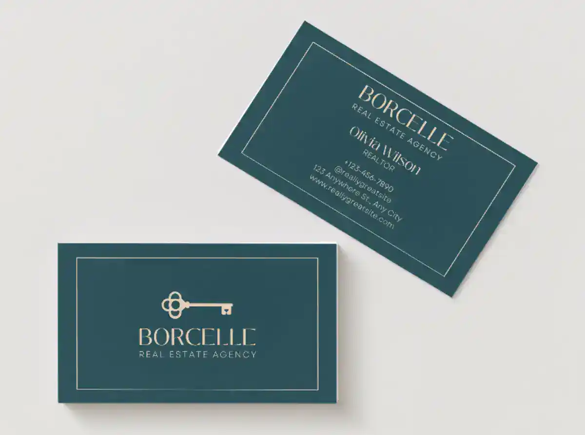 Business card for Borcelle Real Estate Agency with logo and contact details.