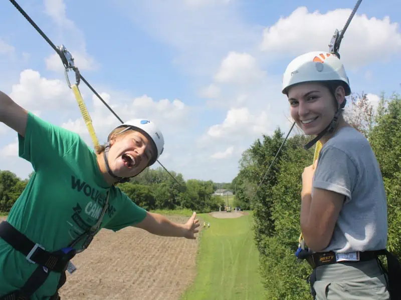 two women at start of double zip line adventure