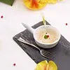une mise en bouche simple à préparer avec ce s saint jacques et huile de truffe