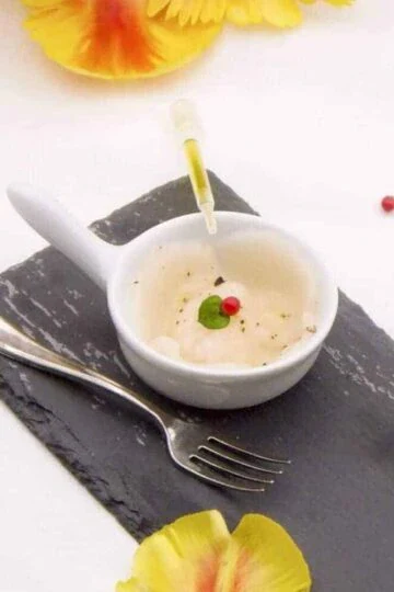 une mise en bouche simple à préparer avec ce s saint jacques et huile de truffe