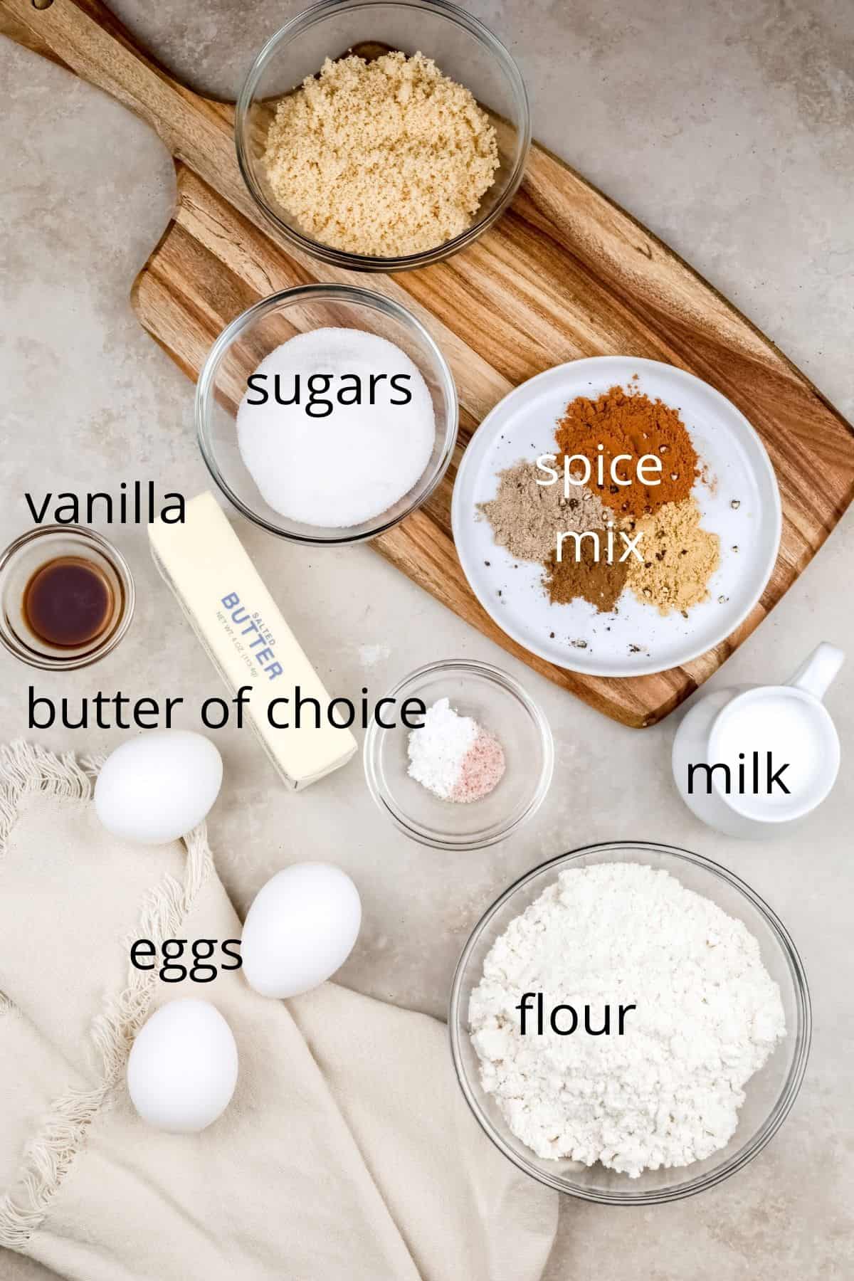 ingredients for cake are shown in various bowls on the kitchen countertop