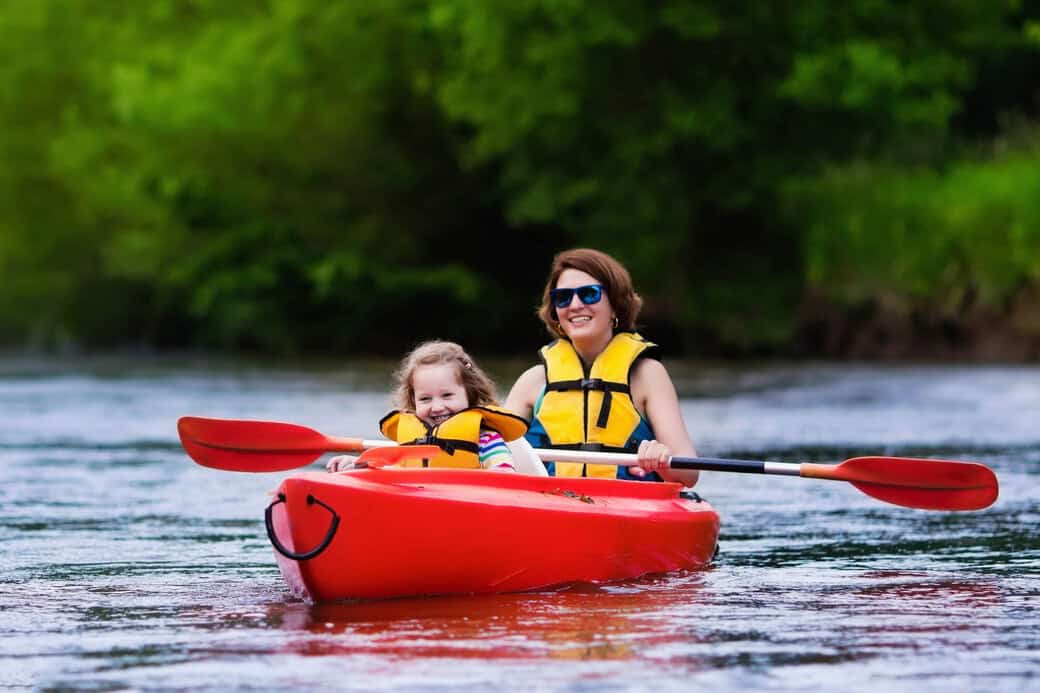 Beginners on kayak - woman and child