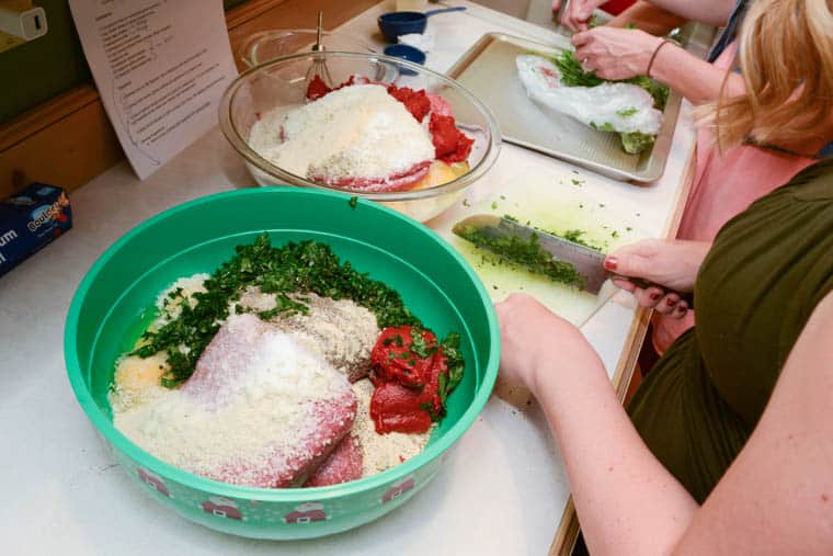 Ingredients for meatballs in a bowl.