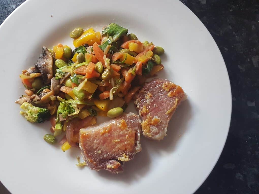 Pork chop with edemame stir fry vegetables