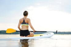 Woman Paddleboard Knees