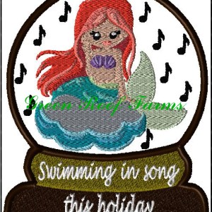 Snow Globe kid dressed as a Mermaid