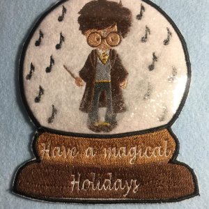 Snow Globe boy dressed as a Magic Boy