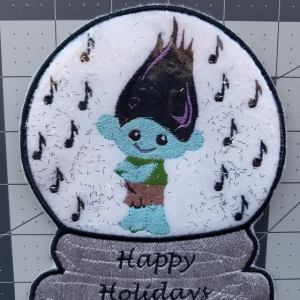 Snow Globe Boy in a troll costume