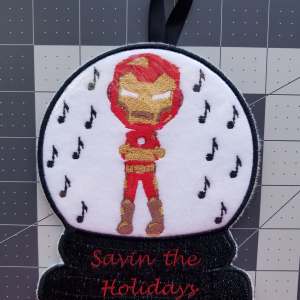 Snow Globe Boy in a superhero costume