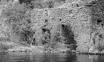 house remains near the river