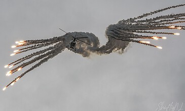 a 109 agusta, wolfie lighting up the sky