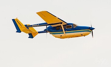 Push-pull Skymaster of Flying Focus. Cessna 337 Skymaster PH-FLF of Flying Focus in blue and yellow livery at the Leaseweb Texel Airshow, Texel International Airport, the Netherlands, August 2018.