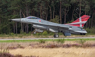 The Danish F-16 with the Dannebrog on its tail. Royal Danish Air Force F-16 E-607 with a red and white Dannebrog flag on the tail, taking off at the Belgian Air Force Days, Kleine-Brogel Air Base, Belgium, September 2018.