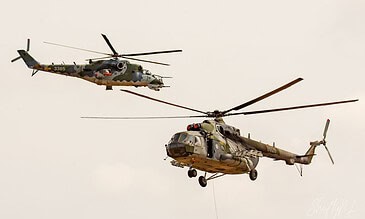 Czech Hind and Hip together. Czech Air Force Mi-24 Hind 3365 and Mi-171Sh 9926 flying together at the Leaseweb Texel Airshow, Texel International Airport, the Netherlands, August 2018.