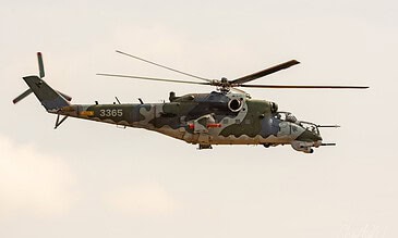 Czech Air Force Mi-24 Hind 3365. Czech Air Force Mil Mi-24 Hind 3365 in camouflage flying past at the Leaseweb Texel Airshow, Texel International Airport, the Netherlands, August 2018.