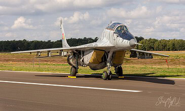 A Slovak MiG-29 Fulcrum on the platform. Slovak Air Force MiG-29 Fulcrum parked on the platform under a blue sky with clouds at the Belgian Air Force Days, Kleine-Brogel Air Base, Belgium, September 2018.