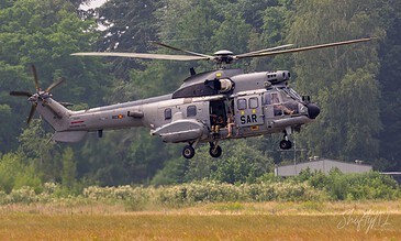 Spanish Air Force AS332B Super Puma SAR 803-11 hovering low during the APROC 2018 personnel recovery exercise at Gilze-Rijen Air Base, the Netherlands, June 2018.