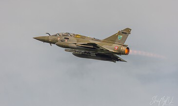 French Air Force Mirage 2000D taking off with afterburner during the Frisian Flag 2018 exercise at Leeuwarden Air Base, the Netherlands, April 2018.