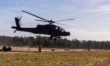 Side profile of an AH-64D Apache of 301 Squadron "Redskins", Royal Netherlands Air Force in flight at the Bergen (Osterheide) shooting range, Germany, March 2017.