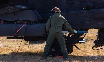 Crew member doing a reload of an AH-64D Apache of 301 Squadron "Redskins", Royal Netherlands Air Force at the Bergen (Osterheide) shooting range, Germany, March 2017.
