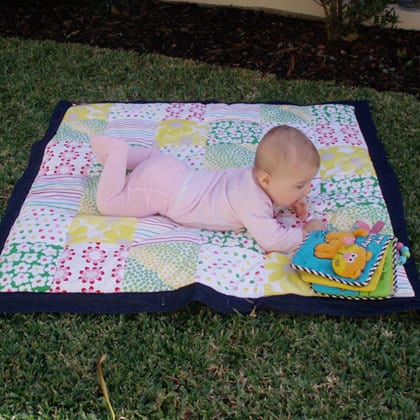 Your baby is likely to put some art of the mat in their mouth. - Best Play Mats for Hardwood Floors | Baby Journey