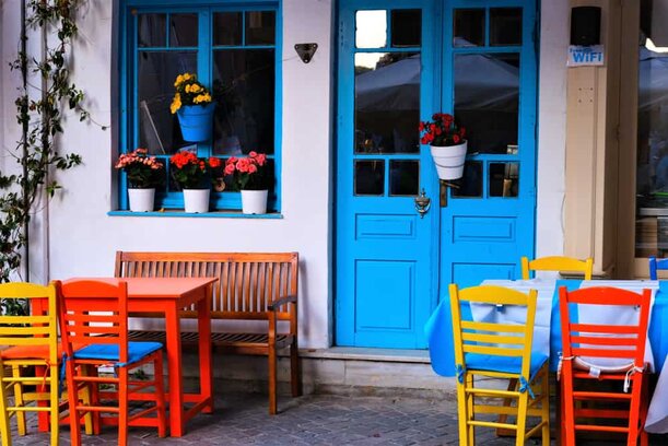 Chania - Greece - Colorful buildings, chairs, doors, alley ways, harbor entrance and street scenes