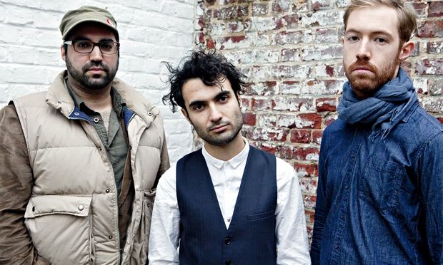 The rhythm section on Mockroot: (from left to right) Sam Minaie (bass), Tigran Hamasyan, and Arthur Hnatek (drums)  CREDIT: Maeve Stam 