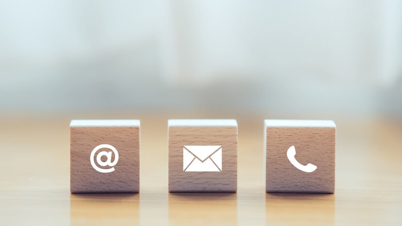 social media, email and phone icons are on display on wooden blocks to show how you can learn more about GPR with US Radar