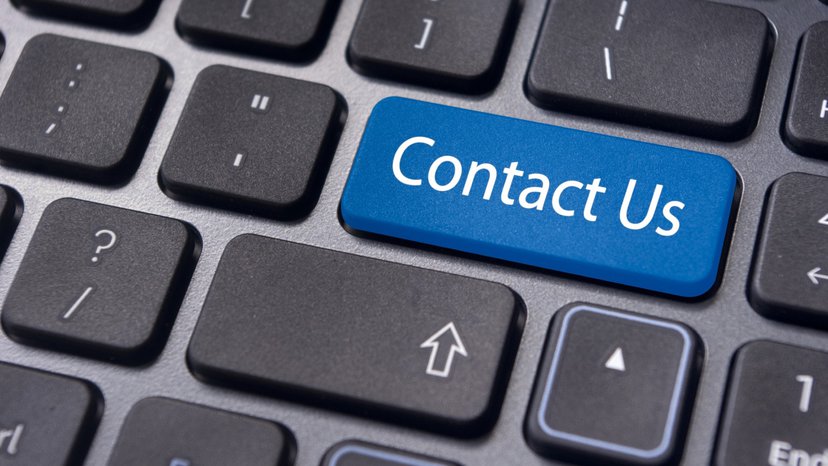 a contact us button displays on a keyboard