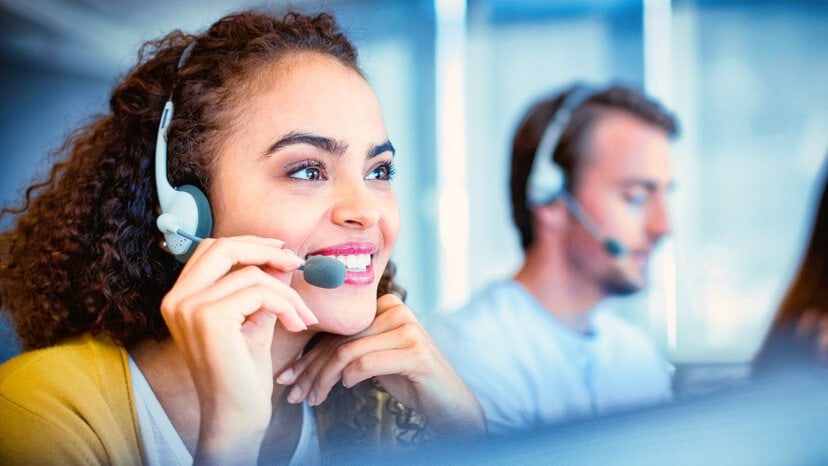 a customer service agent talks on a headset