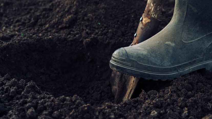 a person digs a hole in the ground to find impressive demonstrations of GPR accuracy