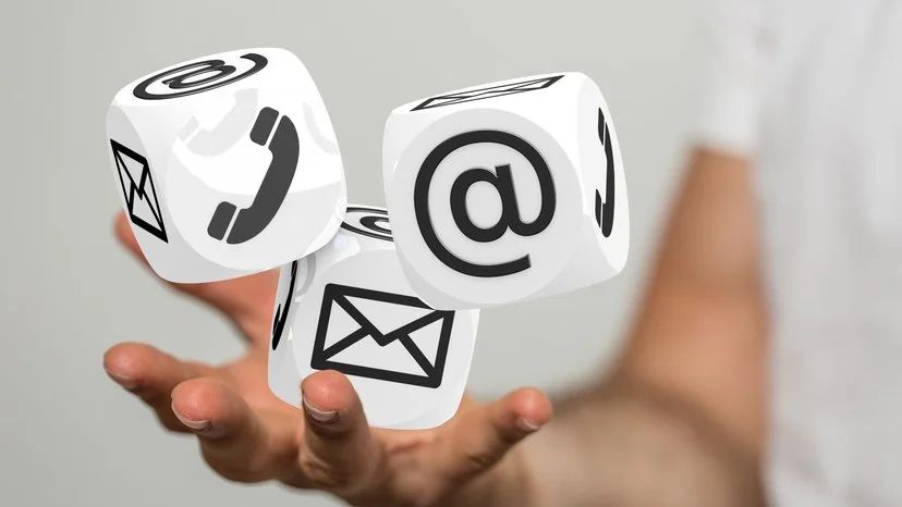 contact us blocks hover over a person’s hand